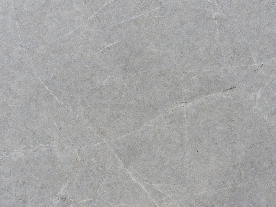 Close up of honed grey natural stone surface - architectural_stone_finish.jpg
